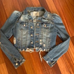 Distressed denim jacket with puff sleeves